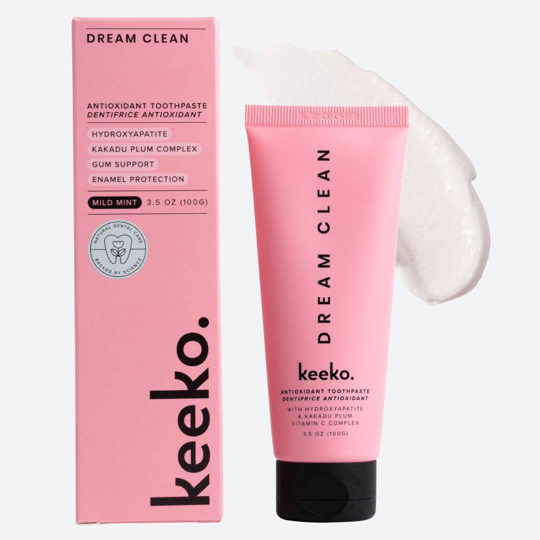 Dream Clean Antioxidant Toothpaste tube with a swirl of formula, enriched with natural ingredients.